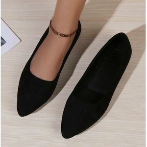 Black pointy flats